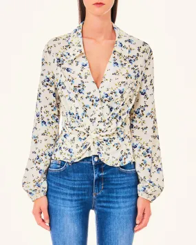 Blusa in viscosa a maniche lunghe a fantasia fiorellini azzurri con drappeggio incrociato